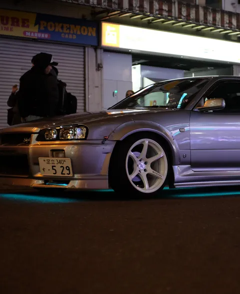 Nissan Skyline R34 drift car on the streets of Akihabara, Tokyo at night
